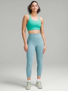 Lululemon Wunder Train High-Rise Tight 25"
Light Blue - tide teal size 6
